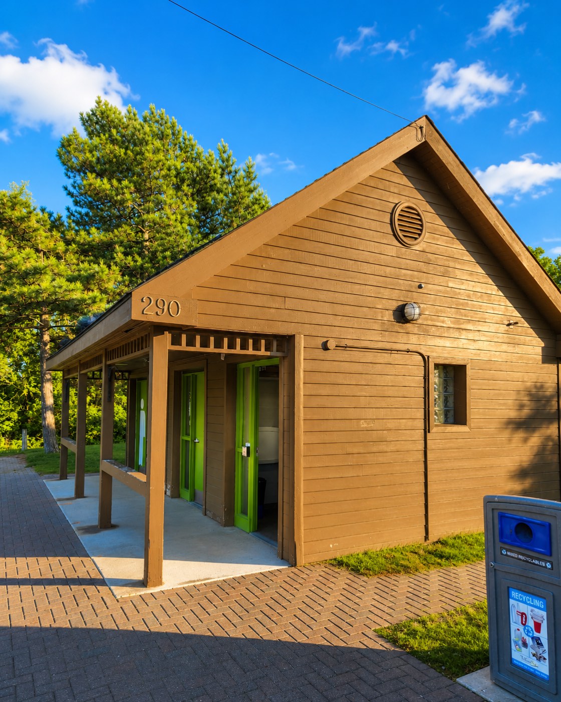 290 Mill St public washroom building with address marker on porch roof